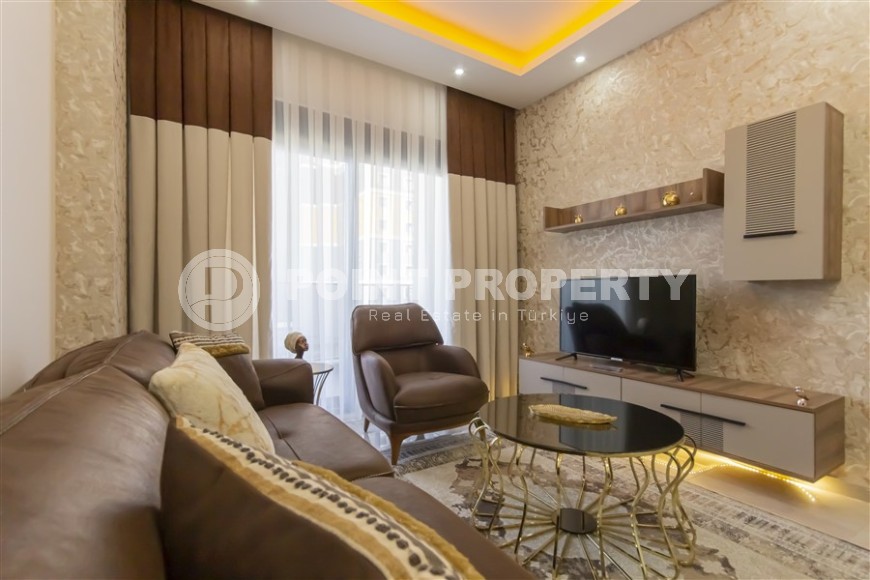 Small apartment with modern design, comfortable furniture and the latest appliances, in a popular area of Alanya - Mahmutlar-id-7273-photo-3