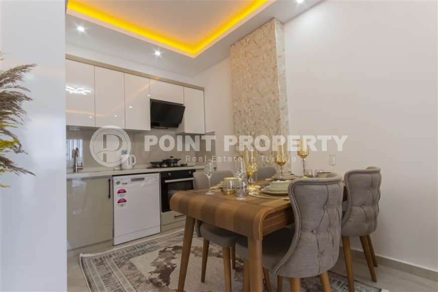 Small apartment with modern design, comfortable furniture and the latest appliances, in a popular area of Alanya - Mahmutlar-id-7273-photo-5