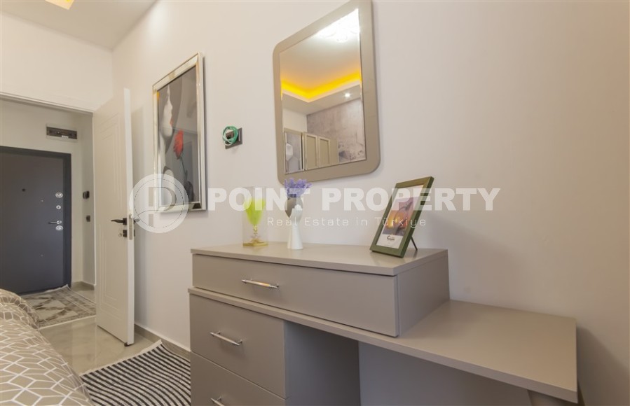 Small apartment with modern design, comfortable furniture and the latest appliances, in a popular area of Alanya - Mahmutlar-id-7273-photo-9