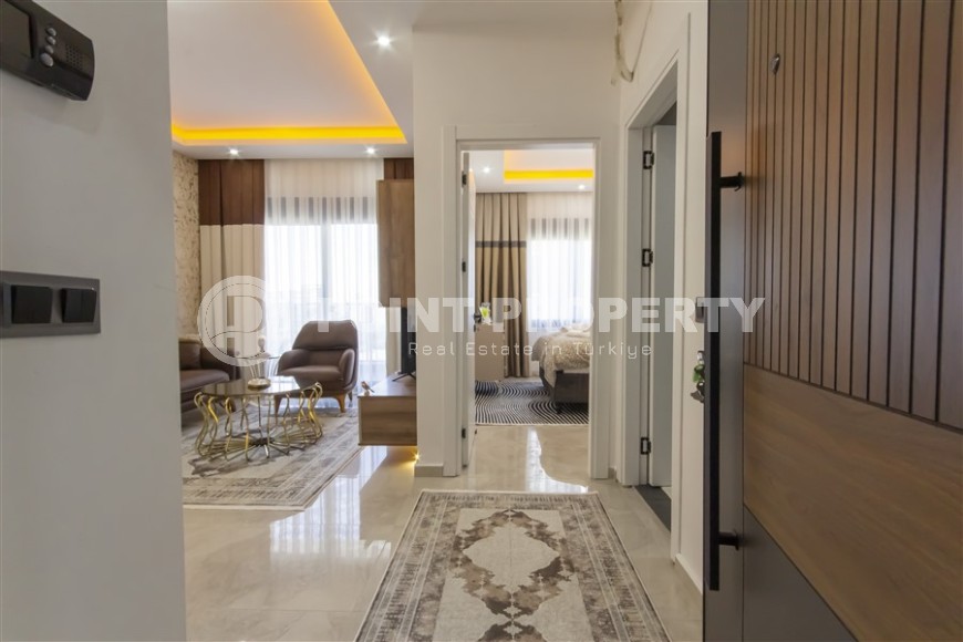 Small apartment with modern design, comfortable furniture and the latest appliances, in a popular area of Alanya - Mahmutlar-id-7273-photo-10