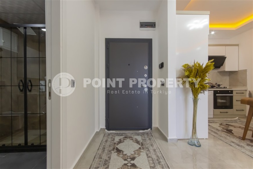 Small apartment with modern design, comfortable furniture and the latest appliances, in a popular area of Alanya - Mahmutlar-id-7273-photo-11