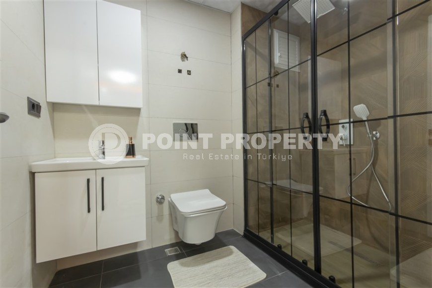 Small apartment with modern design, comfortable furniture and the latest appliances, in a popular area of Alanya - Mahmutlar-id-7273-photo-12