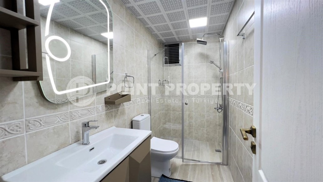 Просторная квартира с мебелью и бытовой техникой в 100 метрах от моря, в центре современного района Аланьи - Махмутлар-id-7279-фото-11