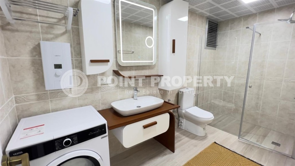 Просторная квартира с мебелью и бытовой техникой в 100 метрах от моря, в центре современного района Аланьи - Махмутлар-id-7279-фото-12