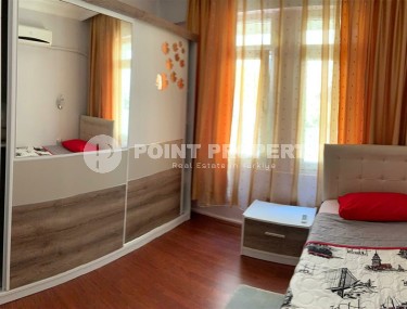 Cozy apartment 2+1, with a total area of 90 m2, on the very shore of the Mediterranean Sea, in the center of Mahmutlar district-id-7281-photo-4