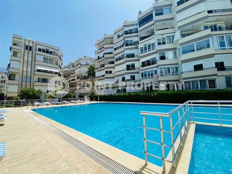 Cozy apartment 2+1, with a total area of 90 m2, on the very shore of the Mediterranean Sea, in the center of Mahmutlar district-id-7281-photo-7