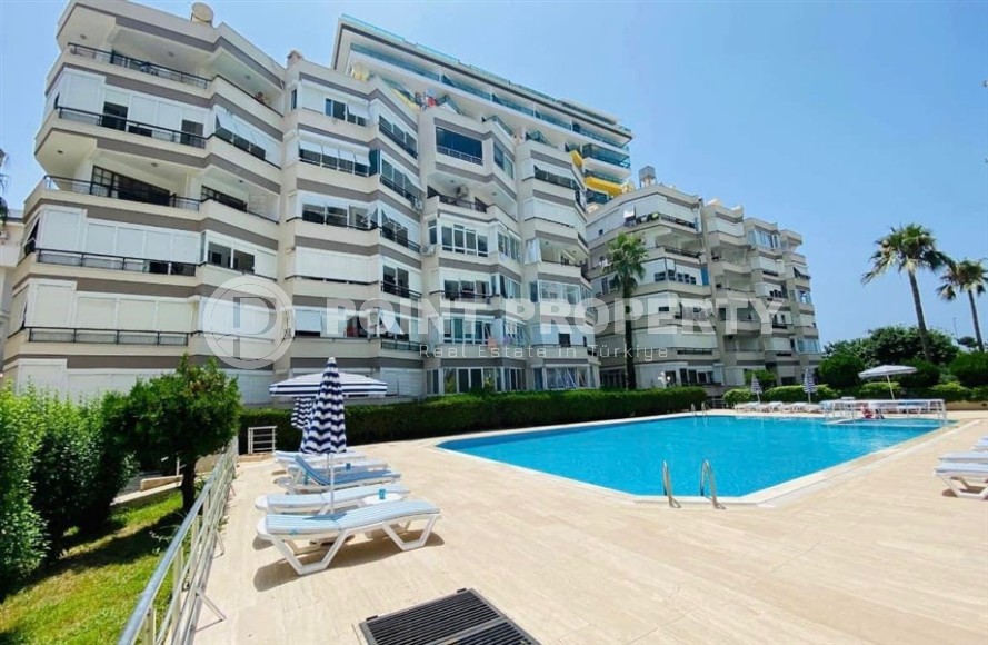 Cozy apartment 2+1, with a total area of 90 m2, on the very shore of the Mediterranean Sea, in the center of Mahmutlar district-id-7281-photo-9