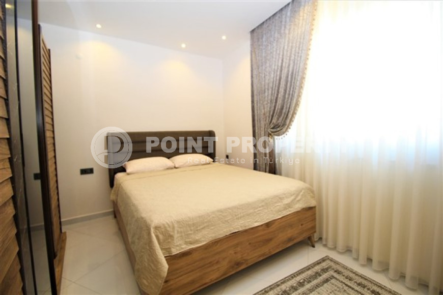 Cozy two-room apartment with an area of 60 m2, in the Mahmutlar area, 600 meters from the Mediterranean coast.-id-1565-photo-7