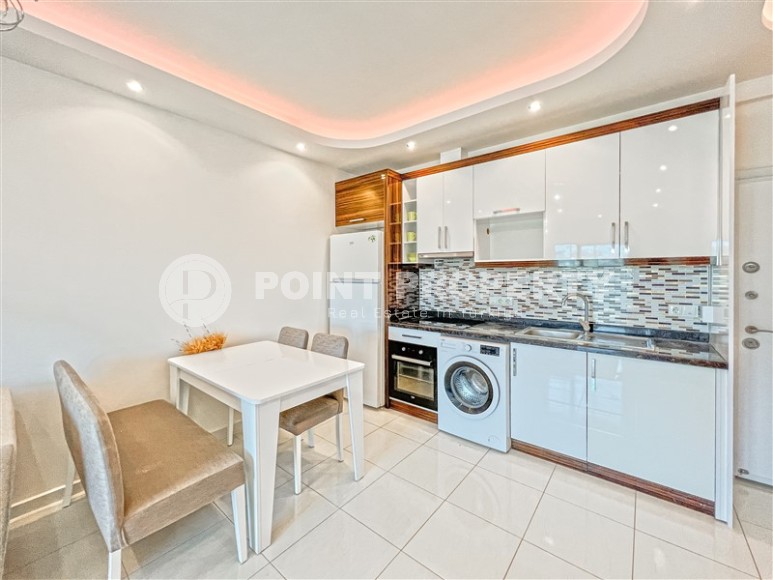 Modern 1+1 apartment with furniture, 500 meters from the sea, Mahmutlar district-id-3401-photo-5