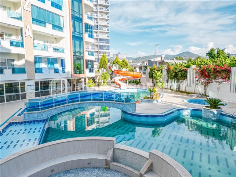 Modern 1+1 apartment with furniture, 500 meters from the sea, Mahmutlar district-id-3401-photo-14