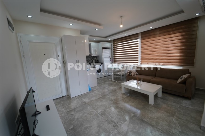 Compact apartment 1+1, with a total area of 50 m2, in the center of the European region of Alanya - Lower Oba-id-7313-photo-3