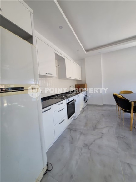 Two bedroom apartment, 90m² in a complex with a swimming pool under construction, in Alanya - Oba-id-1566-photo-2