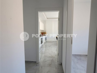 Two bedroom apartment, 90m² in a complex with a swimming pool under construction, in Alanya - Oba-id-1566-photo-4