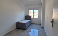 Two bedroom apartment, 90m² in a complex with a swimming pool under construction, in Alanya - Oba-id-1566-photo-6