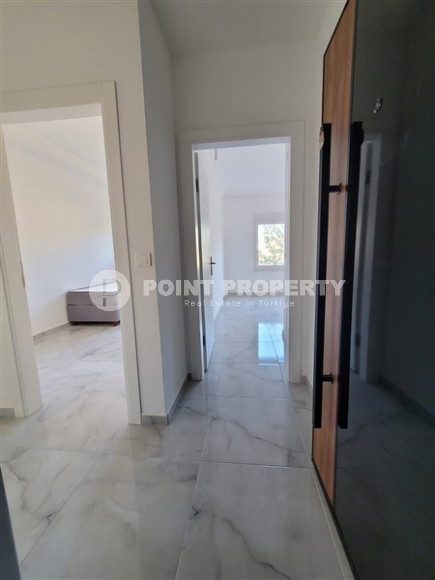 Two bedroom apartment, 90m² in a complex with a swimming pool under construction, in Alanya - Oba-id-1566-photo-7