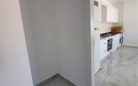 Two bedroom apartment, 90m² in a complex with a swimming pool under construction, in Alanya - Oba-id-1566-photo-8