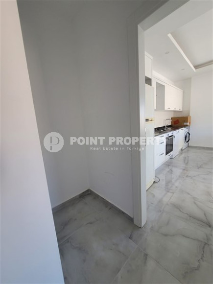 Two bedroom apartment, 90m² in a complex with a swimming pool under construction, in Alanya - Oba-id-1566-photo-8