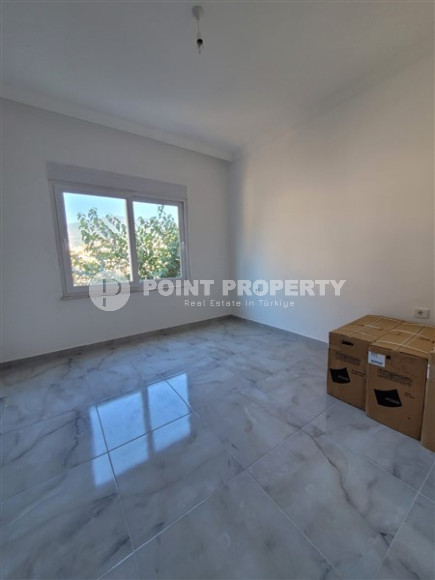 Two bedroom apartment, 90m² in a complex with a swimming pool under construction, in Alanya - Oba-id-1566-photo-10