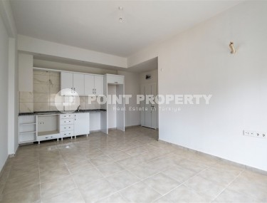 Inexpensive apartment with fine finishing two and a half kilometers from the sea, in a promising area of Alanya - Avsallar-id-7323-photo-3