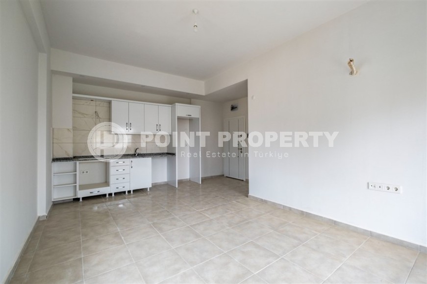 Inexpensive apartment with fine finishing two and a half kilometers from the sea, in a promising area of Alanya - Avsallar-id-7323-photo-3