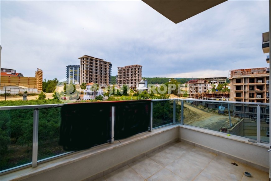 Inexpensive apartment with fine finishing two and a half kilometers from the sea, in a promising area of Alanya - Avsallar-id-7323-photo-7