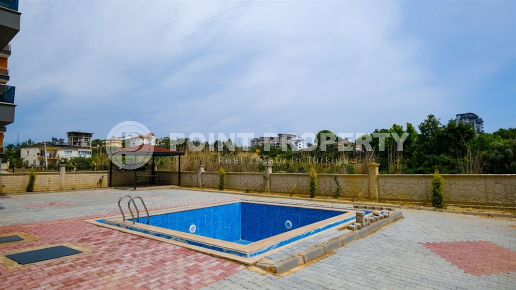 Inexpensive apartment with fine finishing two and a half kilometers from the sea, in a promising area of Alanya - Avsallar-id-7323-photo-8
