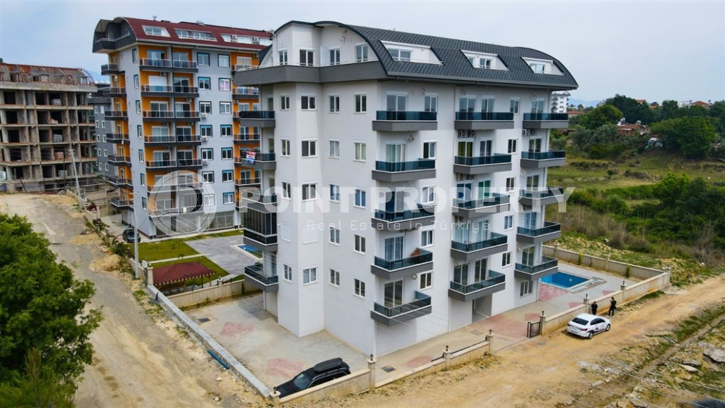 Inexpensive apartment with fine finishing two and a half kilometers from the sea, in a promising area of Alanya - Avsallar-id-7323-photo-9