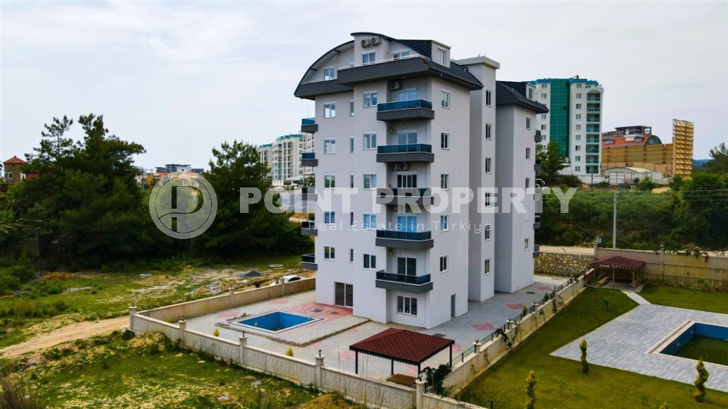 Inexpensive apartment with fine finishing two and a half kilometers from the sea, in a promising area of Alanya - Avsallar-id-7323-photo-10