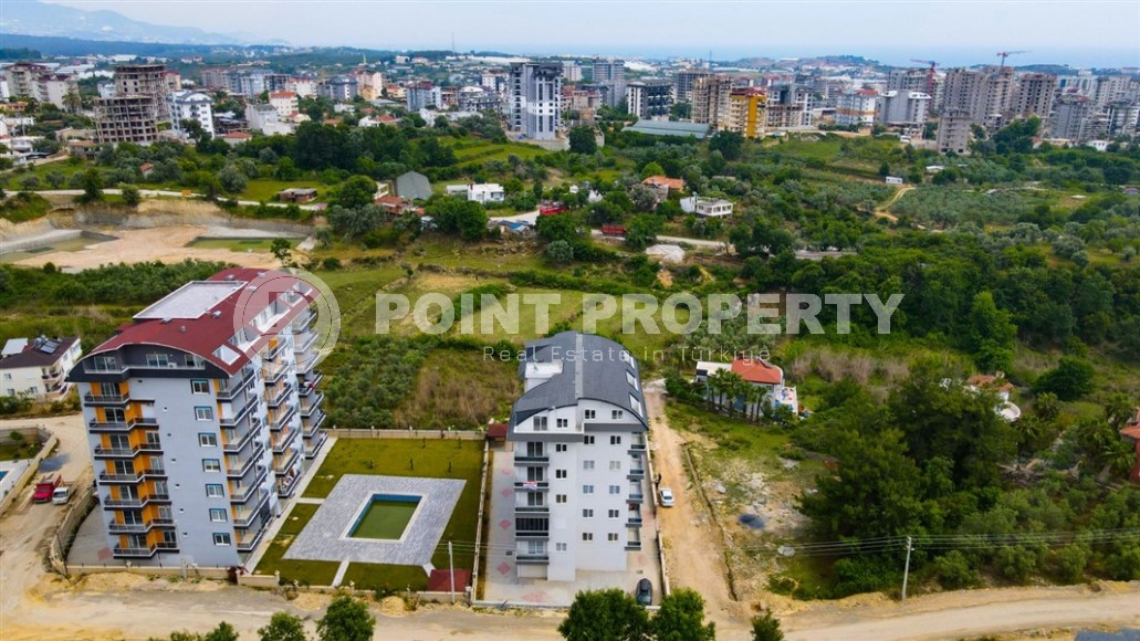 Inexpensive apartment with fine finishing two and a half kilometers from the sea, in a promising area of Alanya - Avsallar-id-7323-photo-11