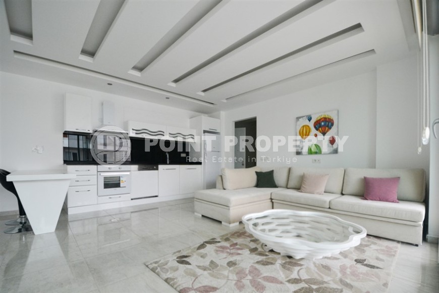 Панорамная двухуровневая квартира с видом на море, на 5-м этаже с мансардой в центре престижного района Аланьи - Кестель-id-7325-фото-1