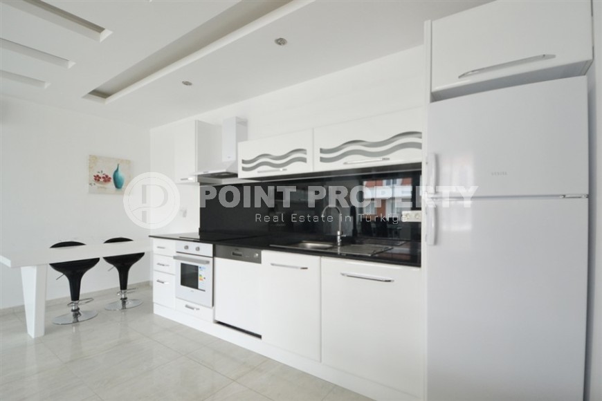 Панорамная двухуровневая квартира с видом на море, на 5-м этаже с мансардой в центре престижного района Аланьи - Кестель-id-7325-фото-2