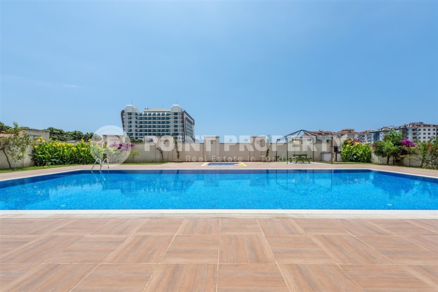 Панорамная двухуровневая квартира с видом на море, на 5-м этаже с мансардой в центре престижного района Аланьи - Кестель-id-7325-фото-18