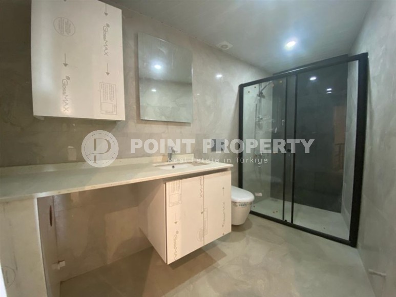 New two-level apartment 3+1, with a total area of 160 m2, in the very center of Alanya-id-7335-photo-15