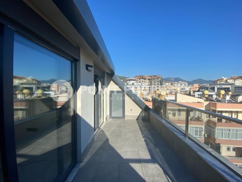 New two-level apartment 3+1, with a total area of 160 m2, in the very center of Alanya-id-7335-photo-19