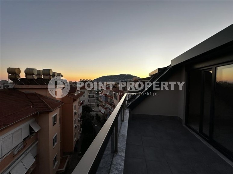 New two-level apartment 3+1, with a total area of 160 m2, in the very center of Alanya-id-7335-photo-21