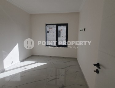 Небольшая квартира 1+1 с чистой отделкой в 700 метрах от моря, в современном центре района Аланьи - Махмутлар-id-7337-фото-5