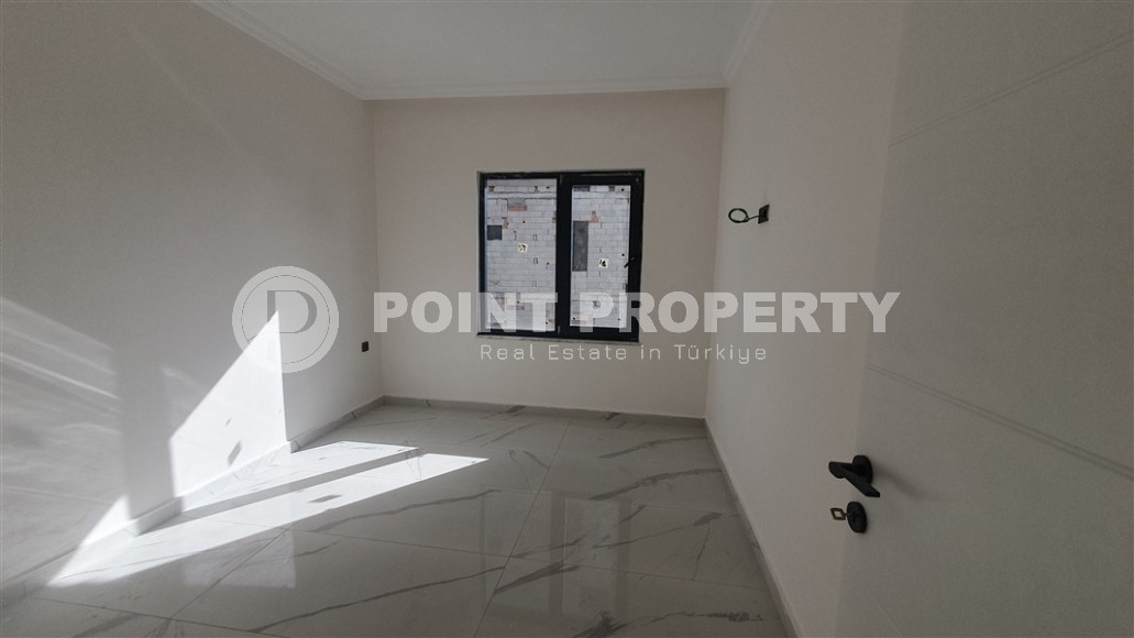 Небольшая квартира 1+1 с чистой отделкой в 700 метрах от моря, в современном центре района Аланьи - Махмутлар-id-7337-фото-5