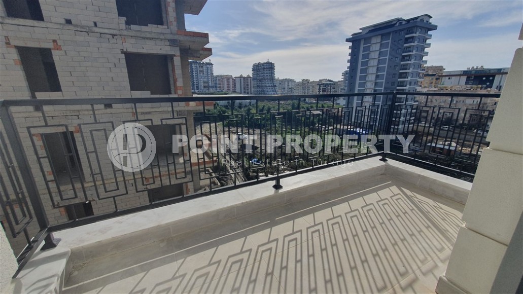 Небольшая квартира 1+1 с чистой отделкой в 700 метрах от моря, в современном центре района Аланьи - Махмутлар-id-7337-фото-7