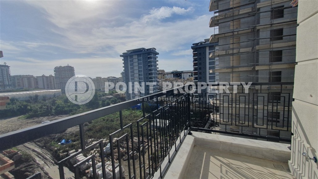 Небольшая квартира 1+1 с чистой отделкой в 700 метрах от моря, в современном центре района Аланьи - Махмутлар-id-7337-фото-8