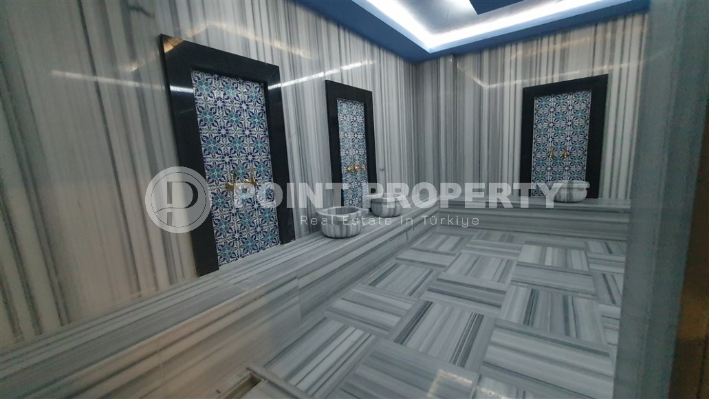 Небольшая квартира 1+1 с чистой отделкой в 700 метрах от моря, в современном центре района Аланьи - Махмутлар-id-7337-фото-10