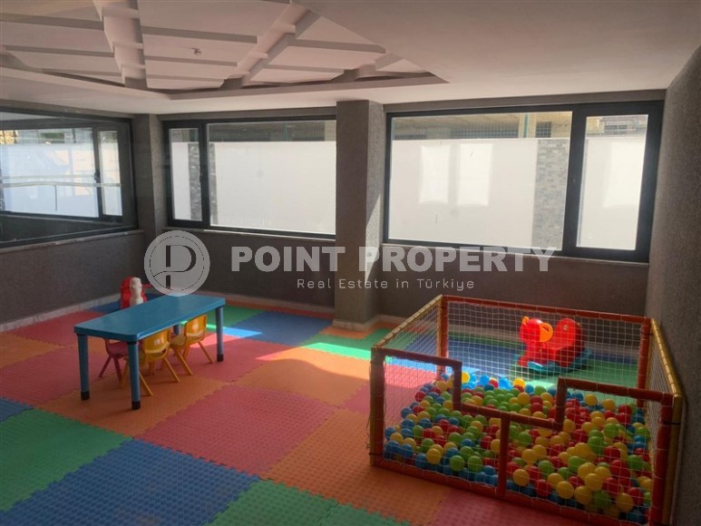 Небольшая квартира 1+1 с чистой отделкой в 700 метрах от моря, в современном центре района Аланьи - Махмутлар-id-7337-фото-12