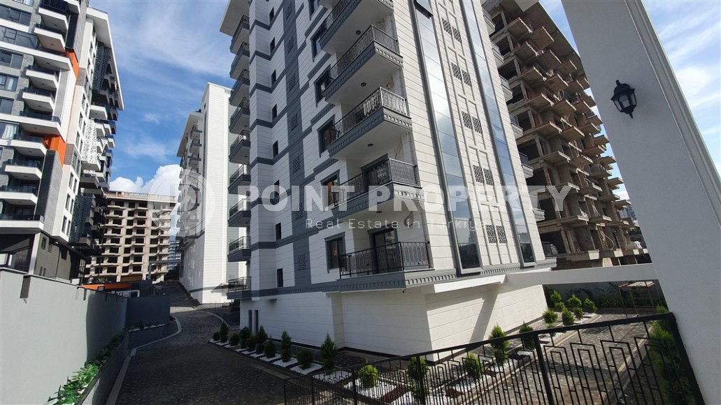 Небольшая квартира 1+1 с чистой отделкой в 700 метрах от моря, в современном центре района Аланьи - Махмутлар-id-7337-фото-16