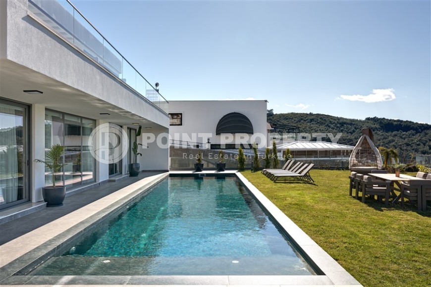 Роскошная двухэтажная вилла 4+1, общей площадью 616 м2, с панорамным видом на море и горы-id-7346-фото-24