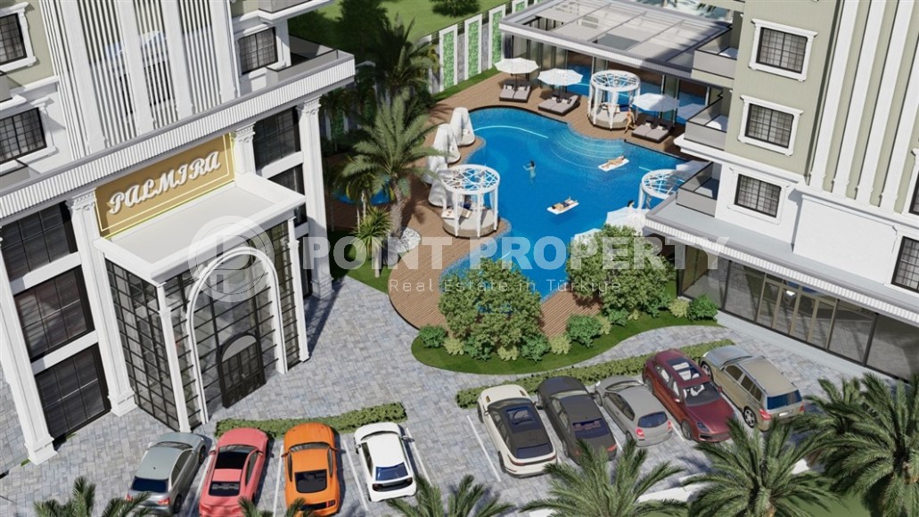 Новые апартаменты 1+1 в здании на этапе строительства в 200 метрах от моря в центре района Каргыджак.-id-4123-фото-5