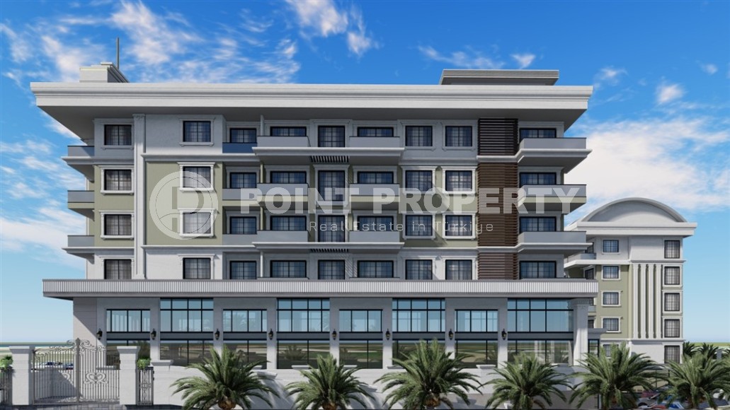 Новые апартаменты 1+1 в здании на этапе строительства в 200 метрах от моря в центре района Каргыджак.-id-4123-фото-7