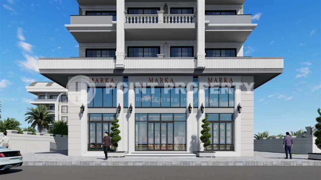 Новые апартаменты 1+1 в здании на этапе строительства в 200 метрах от моря в центре района Каргыджак.-id-4123-фото-10