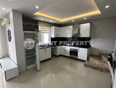 Современная двухуровневая квартира 2+1 с видом на горы, в зеленом, экологически чистом районе Аланьи - Кестель-id-7348-фото-3