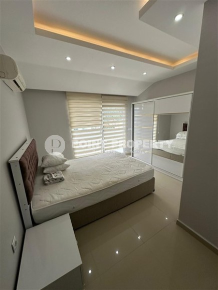 Современная двухуровневая квартира 2+1 с видом на горы, в зеленом, экологически чистом районе Аланьи - Кестель-id-7348-фото-6