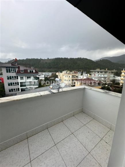 Современная двухуровневая квартира 2+1 с видом на горы, в зеленом, экологически чистом районе Аланьи - Кестель-id-7348-фото-14