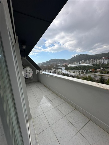 Современная двухуровневая квартира 2+1 с видом на горы, в зеленом, экологически чистом районе Аланьи - Кестель-id-7348-фото-15